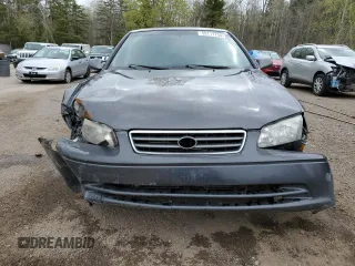 2001 Toyota Camry LE z VIN JT2BF22K010295564, wystawiony jako Copart lot #55111755 z przebiegiem 379 337 mil mil oraz Szkody całkowita. Historia ofert i sprzedaży dostępna na DreamBid. Obrazek 5.