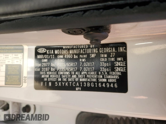 2011 Kia Sorento LX with VIN 5XYKTCA13BG164946, listed as a Copart auction lot 49816605 with 81,404 mi miles and Salvage Title. Bid and sale history available at DreamBid. Image 14.
