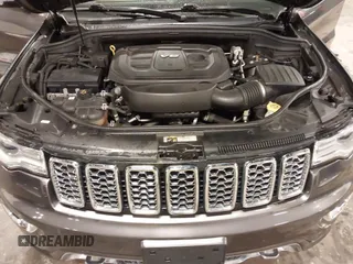 2017 Jeep Grand Cherokee Overland z VIN 1C4RJFCG6HC641812, wystawiony jako IAAI lot #42053404 z przebiegiem 129 184 mil mil oraz . Historia ofert i sprzedaży dostępna na DreamBid. Obrazek 10.