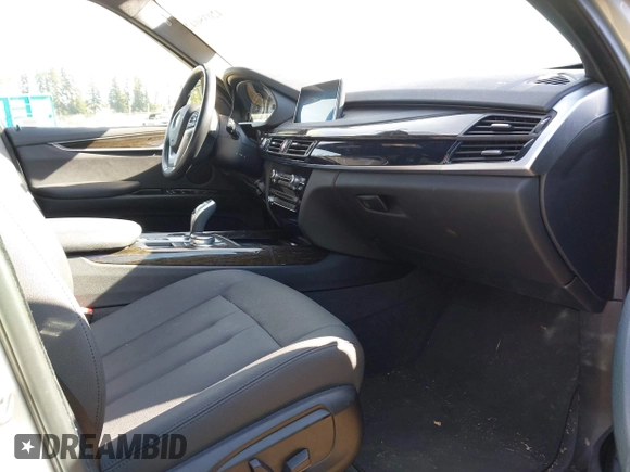 2018 BMW X5 xDrive35i with VIN 5UXKR0C52JL073889, listed as a IAAI auction lot 42035042 with 36,564 mi miles. Bid and sale history available at carsss.com. Image 5.