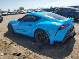 2021 Toyota GR Supra 2.0 with VIN WZ1DB2C04MW039858, listed as a Copart auction lot 70049874 with 10,586 mi miles and Salvage Title. Bid and sale history available at carsss.com. Image 2.
