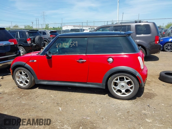 2003 MINI Hardtop S z VIN WMWRE33443TD60271, wystawiony jako IAAI lot #42129529 z przebiegiem 94 082 mil mil oraz . Historia ofert i sprzedaży dostępna na DreamBid. Obrazek 14.