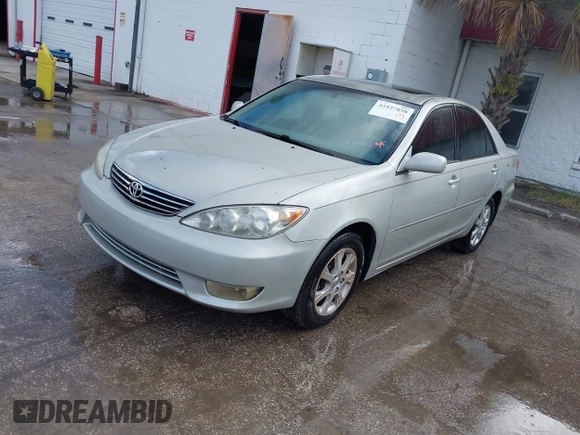 2005 Toyota Camry LE with VIN JTDBF32KX50163799, listed as a IAAI auction lot 41937898 with 140,616 mi miles and . Bid and sale history available at DreamBid. Image 2.