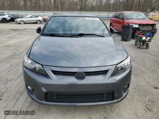 2011 Scion tC with VIN JTKJF5C71B3017022, listed as a Copart auction lot 52859865 with 220,603 mi miles and Salvage Title. Bid and sale history available at carsss.com. Image 5.