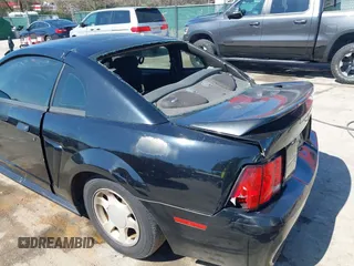 2000 Ford Mustang with VIN 1FAFP4042YF252802, listed as a IAAI auction lot 41994872 with 189,081 mi miles. Bid and sale history available at carsss.com. Image 6.