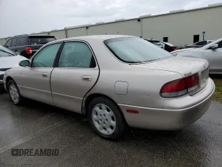 1993 Mazda 626 z VIN 1YVGE22B9P5208685, wystawiony jako Copart lot #73931064 z przebiegiem 91 446 mil mil oraz Nie do naprawy. Historia ofert i sprzedaży dostępna na DreamBid. Obrazek 2.