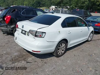 2015 Volkswagen Jetta SE with VIN 3VWD17AJ7FM235397, listed as a IAAI auction lot 40158694 with 205,163 mi miles and . Bid and sale history available at DreamBid. Image 4.