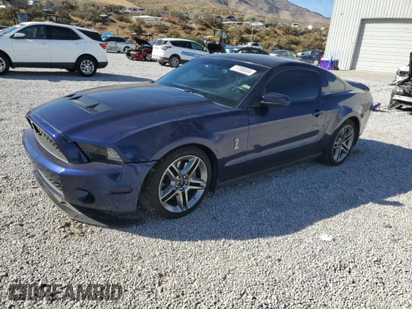 2010 Ford Mustang GT500 with VIN 1ZVBP8JS1A5105926, listed as a Copart auction lot 77398504 with 63,699 mi miles and Salvage title. Bid and sale history available at DreamBid. Image 1.