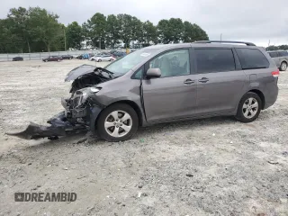 2014 Toyota Sienna LE AAS с VIN 5TDKK3DC5ES523091, выставлен на аукционе Copart как лот 65041995 с пробегом 141 232 миль миль и Списание • Salvage title. История ставок и продаж доступна на DreamBid. Изображение 1.