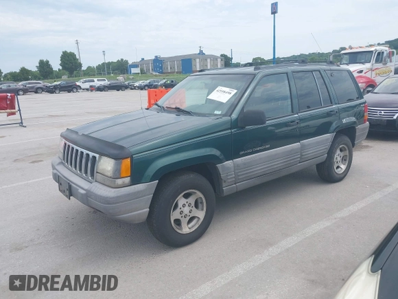 1998 Jeep Grand Cherokee Laredo with VIN 1J4GZ58S7WC284106, listed as a IAAI auction lot 42558498 with 316,354 mi miles and . Bid and sale history available at DreamBid. Image 2.