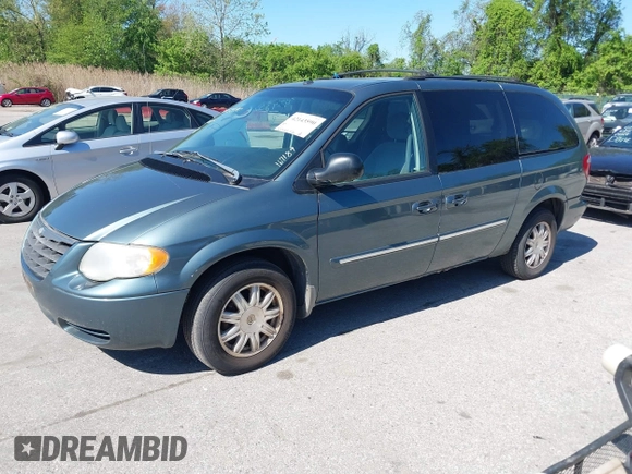 2007 Chrysler Town & Country LWB Touring with VIN 2A4GP54L47R167189, listed as a IAAI auction lot 42143590 with 165,547 mi miles. Bid and sale history available at carsss.com. Image 2.
