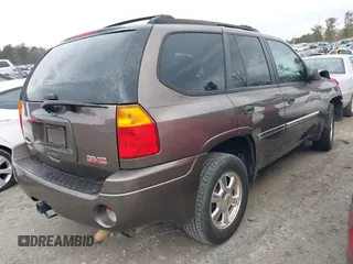 2008 GMC Envoy SLE2 with VIN 1GKDS13S882139862, listed as a IAAI auction lot 41458976 with 195,973 mi miles. Bid and sale history available at carsss.com. Image 4.
