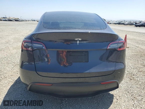 2024 Tesla Model Y с VIN 7SAYGDEDXRF095167, выставлен на аукционе Copart как лот 61676245 с пробегом 12 988 миль миль и Списание • Salvage title. История ставок и продаж доступна на DreamBid. Изображение 6.