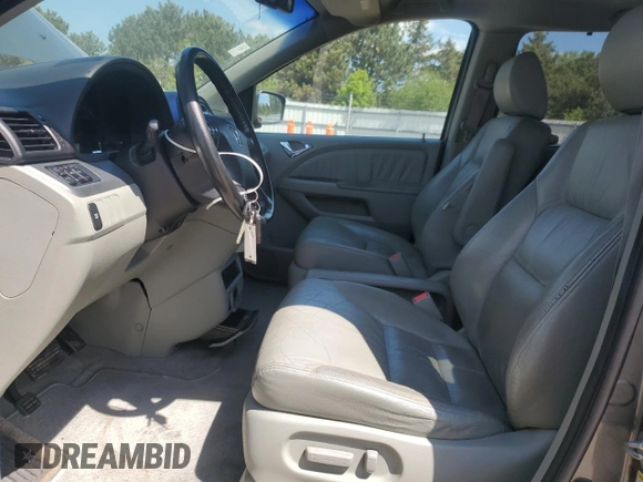 2008 Honda Odyssey EX-L z VIN 5FNRL38748B408516, wystawiony jako Copart lot #55394745 z przebiegiem 144 176 mil mil oraz Szkoda całkowita • Salvage title. Historia ofert i sprzedaży dostępna na DreamBid. Obrazek 7.