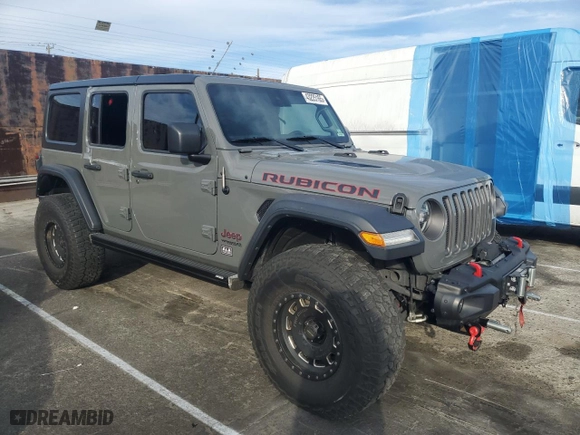 2019 Jeep Wrangler Unlimited Rubicon with VIN 1C4HJXFG7KW604349, listed as a Copart auction lot 43225165 with 35,938 mi miles and Salvage Title. Bid and sale history available at carsss.com. Image 4.