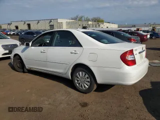 2004 Toyota Camry LE with VIN 4T1BE32K04U291801, listed as a Copart auction lot 54370015 with 164,414 mi miles and Salvage Title. Bid and sale history available at carsss.com. Image 2.