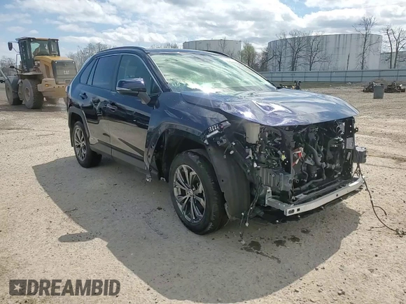 2023 Toyota RAV4 Hybrid XLE Premium with VIN JTMB6RFV2PD097428, listed as a Copart auction lot 52439575 with 13,955 mi miles and Salvage Title. Bid and sale history available at carsss.com. Image 15.