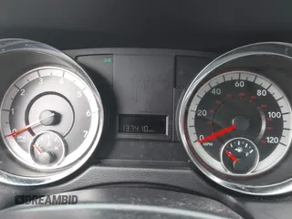2016 Dodge Grand Caravan SE with VIN 2C4RDGBG5GR251689, listed as a IAAI auction lot 42149865 with 137,410 mi miles and . Bid and sale history available at DreamBid. Image 7.