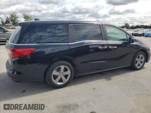 2018 Honda Odyssey EX-L z VIN 5FNRL6H7XJB031245, wystawiony jako Copart lot #59331635 z przebiegiem 74 901 mil mil oraz Czysty tytuł • Clean title. Historia ofert i sprzedaży dostępna na DreamBid. Obrazek 3.