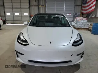 2019 Tesla Model 3 Mid Range z VIN 5YJ3E1EA3KF427229, wystawiony jako Copart lot #60881305 z przebiegiem 78 975 mil mil oraz Czysty tytuł • Clean title. Historia ofert i sprzedaży dostępna na DreamBid. Obrazek 5.