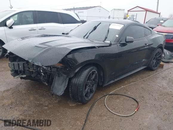 2018 Ford Mustang GT z VIN 1FA6P8CF2J5126231, wystawiony jako IAAI lot #41972432 z przebiegiem 59 402 mil mil oraz . Historia ofert i sprzedaży dostępna na DreamBid. Obrazek 19.