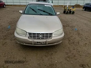 1998 Cadillac Catera z VIN W06VR52R5WR028774, wystawiony jako Copart lot #78085484 z przebiegiem 104 609 mil mil oraz Szkoda całkowita • Salvage title. Historia ofert i sprzedaży dostępna na DreamBid. Obrazek 11.