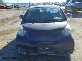 2012 Scion iQ with VIN JTNJJXB07CJ019727, listed as a IAAI auction lot 41428155 with 119,035 mi miles. Bid and sale history available at carsss.com. Image 12.