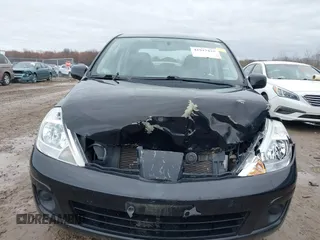2011 Nissan Versa 1.8 S with VIN 3N1BC1AP7BL378133, listed as a IAAI auction lot 41917425 with 124,228 mi miles. Bid and sale history available at carsss.com. Image 12.