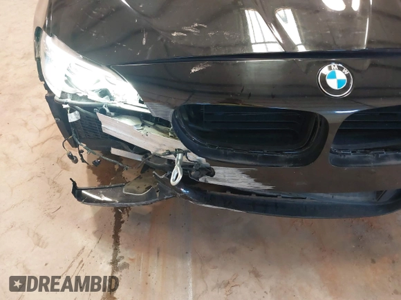 2014 BMW 5 Series 535i with VIN WBA5B1C57ED480208, listed as a IAAI auction lot 41257404 with 114,340 mi miles and . Bid and sale history available at DreamBid. Image 19.