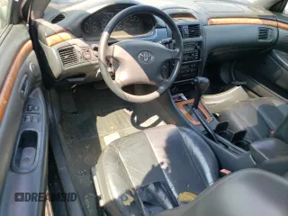2002 Toyota Solara SE with VIN 2T1CF28P72C601861, listed as a Copart auction lot 65175974 with 246,993 mi miles and Salvage Title. Bid and sale history available at DreamBid. Image 8.