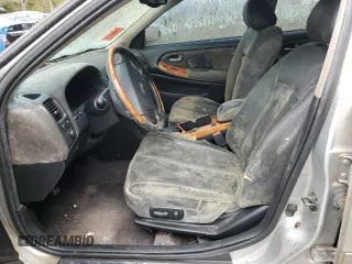 2002 Infiniti I35 Luxury z VIN JNKDA31A02T018859, wystawiony jako Copart lot #77074744 z przebiegiem Nie podano mil oraz Szkoda całkowita • Salvage title. Historia ofert i sprzedaży dostępna na DreamBid. Obrazek 7.
