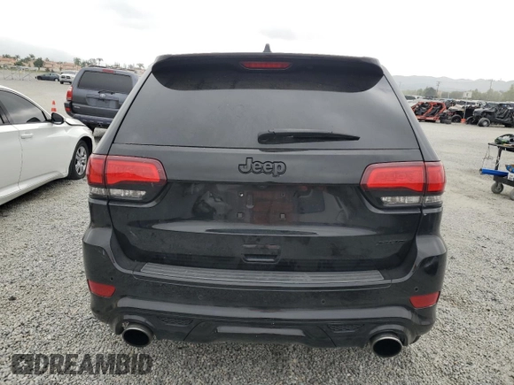 2017 Jeep Grand Cherokee SRT with VIN 1C4RJFDJ1HC904654, listed as a Copart auction lot 55954124 with 82,507 mi miles and Salvage Title. Bid and sale history available at carsss.com. Image 6.