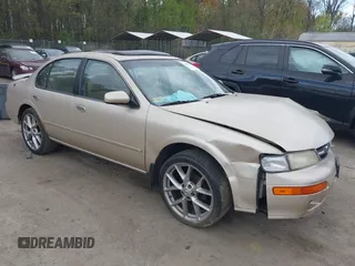 1997 Nissan Maxima GXE z VIN JN1CA21D3VT813946, wystawiony jako IAAI lot #42043810 z przebiegiem 159 125 mil mil oraz . Historia ofert i sprzedaży dostępna na DreamBid. Obrazek 1.