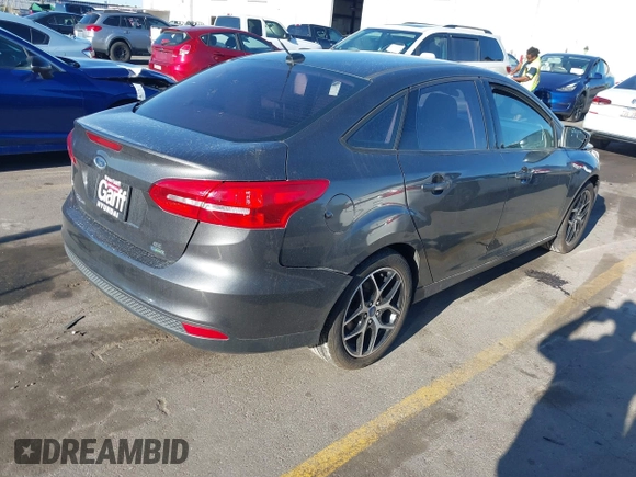 2018 Ford Focus SE with VIN 1FADP3FE0JL270966, listed as a IAAI auction lot 42206548 with 89,067 mi miles and . Bid and sale history available at DreamBid. Image 4.