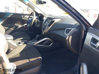 2015 Hyundai Veloster RE:FLEX with VIN KMHTC6AD7FU224291, listed as a IAAI auction lot 41517267 with 151,554 mi miles. Bid and sale history available at carsss.com. Image 5.