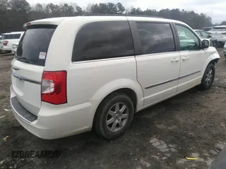 2013 Chrysler Town & Country Touring with VIN 2C4RC1BG7DR526894, listed as a IAAI auction lot 41365168 with 166,003 mi miles. Bid and sale history available at carsss.com. Image 4.