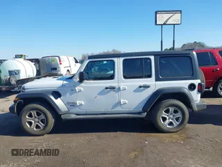 2020 Jeep Wrangler Unlimited Sport S with VIN 1C4HJXDN6LW161341, listed as a IAAI auction lot 41217843 with 74,196 mi miles and . Bid and sale history available at DreamBid. Image 14.
