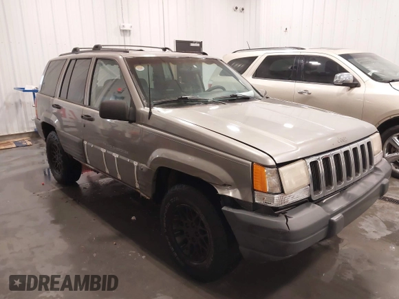 1998 Jeep Grand Cherokee Laredo with VIN 1J4GZ58S3WC343555, listed as a IAAI auction lot 41528943 with 219,146 mi miles. Bid and sale history available at carsss.com. Image 6.