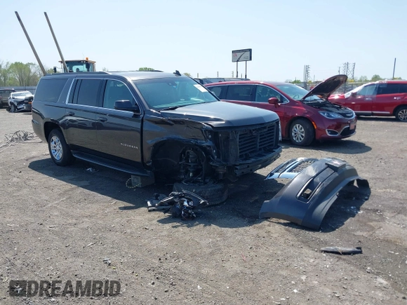 2018 Chevrolet Suburban LT z VIN 1GNSCHKCXJR128787, wystawiony jako IAAI lot #41909965 z przebiegiem 123 020 mil mil oraz . Historia ofert i sprzedaży dostępna na DreamBid. Obrazek 1.