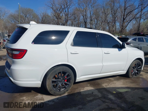 2018 Dodge Durango SRT with VIN 1C4SDJGJXJC395094, listed as a IAAI auction lot 41857351 with 90,106 mi miles and . Bid and sale history available at DreamBid. Image 13.