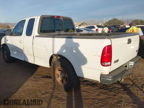 2003 Ford F-150 XL with VIN 2FTRX17L13CB04616, listed as a IAAI auction lot 41114369 with Not provided miles and . Bid and sale history available at DreamBid. Image 3.