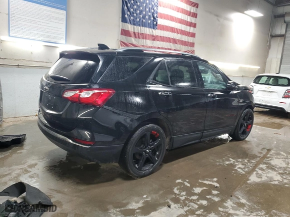 2021 Chevrolet Equinox Premier with VIN 2GNAXNEV0M6148333, listed as a Copart auction lot 48521295 with 57,886 mi miles and Clean Title. Bid and sale history available at carsss.com. Image 3.