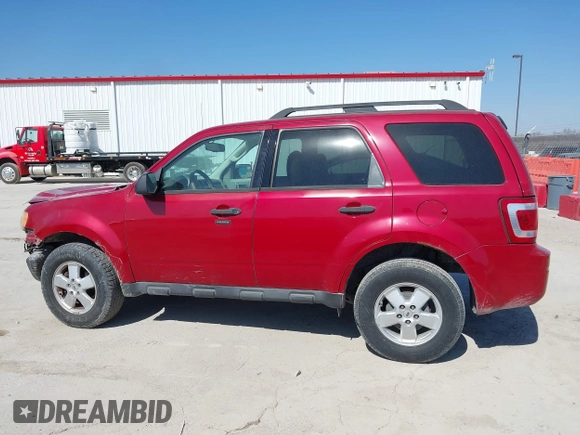 2011 Ford Escape XLT with VIN 1FMCU0D70BKC18662, listed as a IAAI auction lot 41769355 with 173,040 mi miles. Bid and sale history available at carsss.com. Image 14.