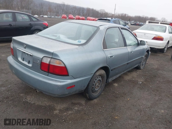 1996 Honda Accord LX with VIN 1HGCD5631TA169122, listed as a IAAI auction lot 42022239 with 164,191 mi miles and . Bid and sale history available at carsss.com. Image 4.