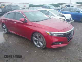 2020 Honda Accord Touring с VIN 1HGCV2F94LA021157, выставлен на аукционе IAAI как лот 42363438 с пробегом 58 681 миль миль и . История ставок и продаж доступна на DreamBid. Изображение 1.