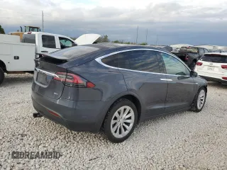 2016 Tesla Model X 70D with VIN 5YJXCAE22GF002253, listed as a Copart auction lot 50700425 with 153,258 mi miles and Salvage Title. Bid and sale history available at carsss.com. Image 3.