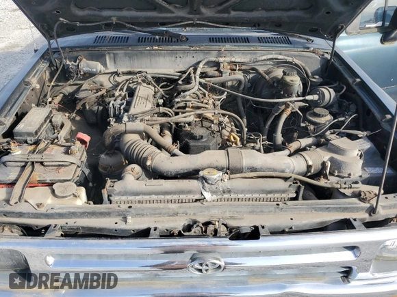 1994 Toyota Pickup z VIN 4TARN93P1RZ213243, wystawiony jako Copart lot #54068005 z przebiegiem 220 450 mil mil oraz Czysty tytuł • Clean title. Historia ofert i sprzedaży dostępna na DreamBid. Obrazek 11.