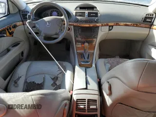 2003 Mercedes-Benz E-Class 5.0L with VIN WDBUF70J93A086939, listed as a Copart auction lot 87022834 with 0 mi miles and Salvage Title. Bid and sale history available at carsss.com. Image 8.