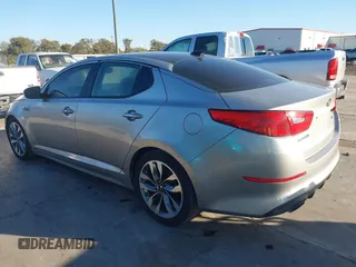 2015 Kia Optima SX Turbo with VIN 5XXGR4A65FG407334, listed as a IAAI auction lot 40743106 with 164,260 mi miles. Bid and sale history available at carsss.com. Image 3.