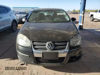 2010 Volkswagen Jetta S with VIN 3VWJZ7AJ7AM051940, listed as a Copart auction lot 54792105 with 159,460 mi miles and Salvage title. Bid and sale history available at DreamBid. Image 5.